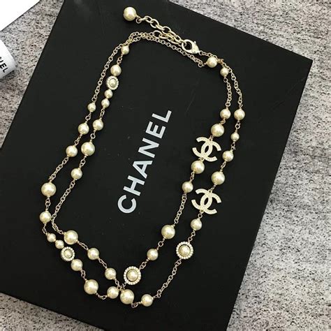 chanel sweater necklace|Chanel sweater black and white.